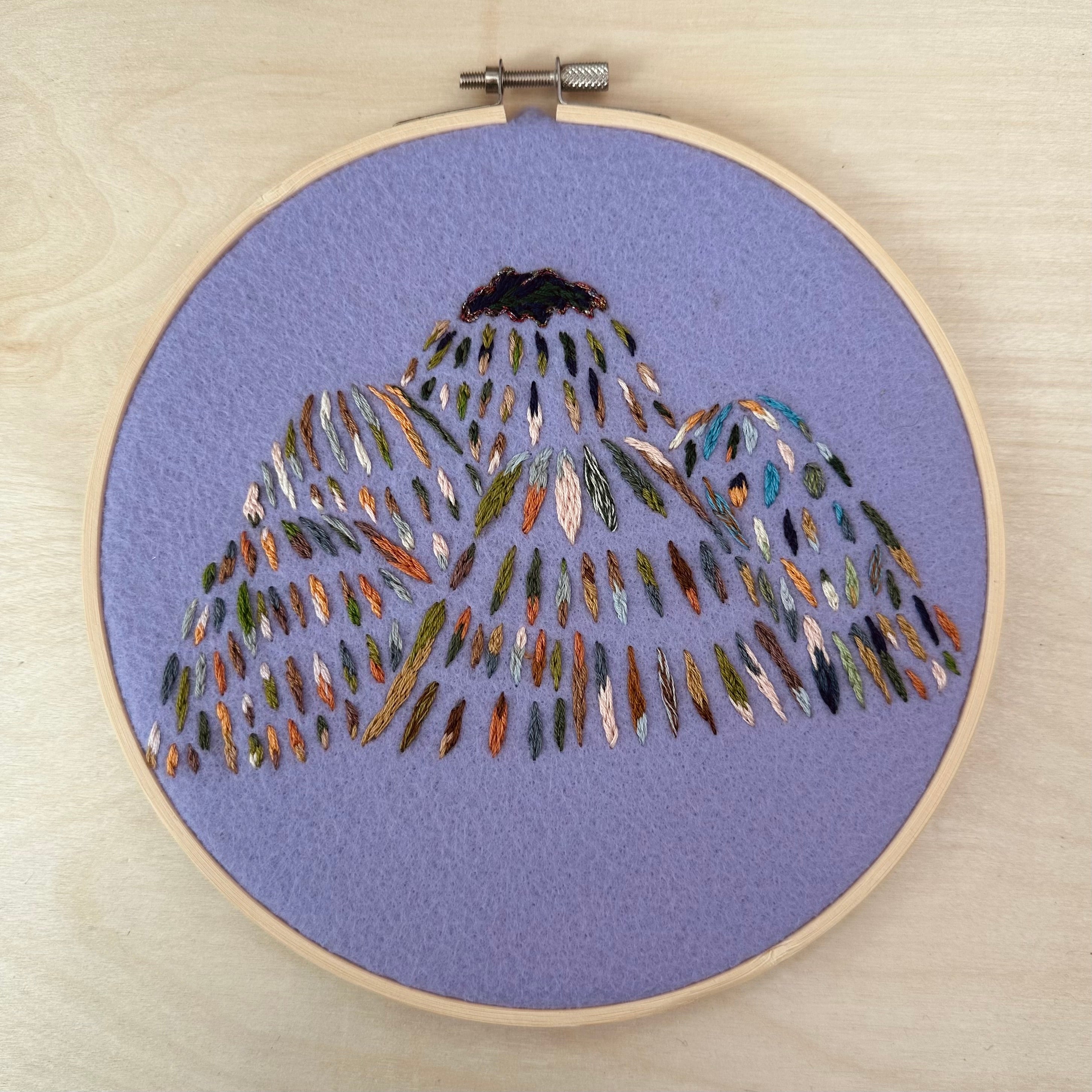 Mountain embroidery art on hoop