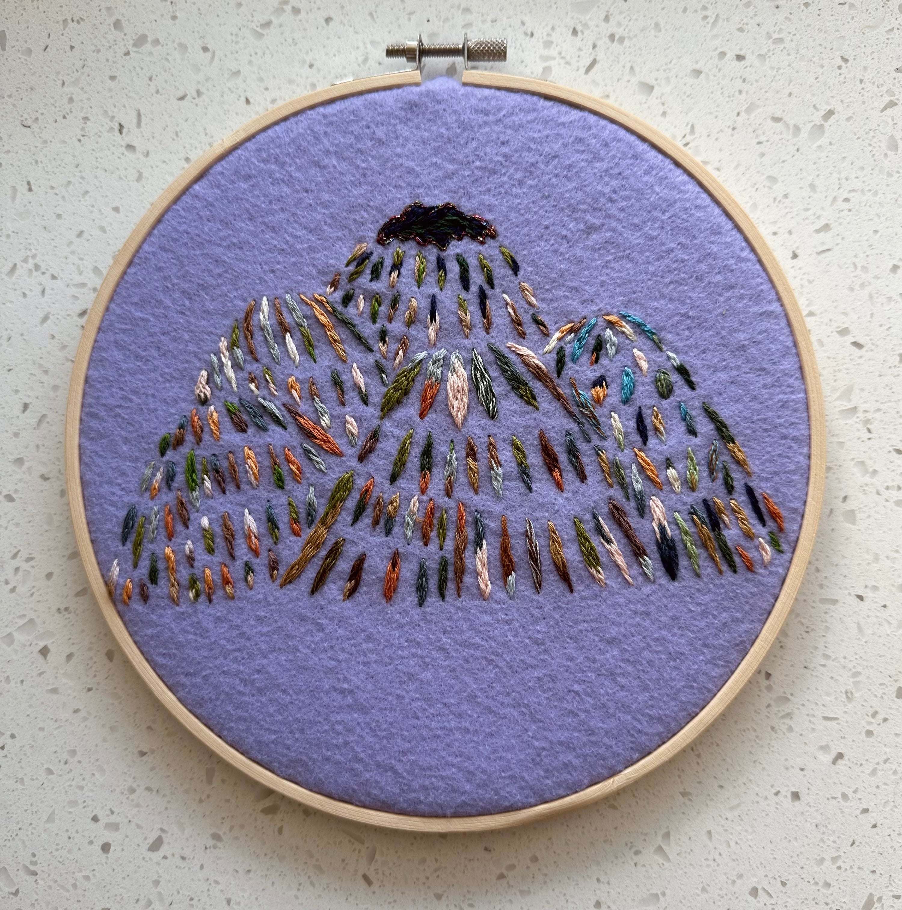 Mountain embroidery art on hoop